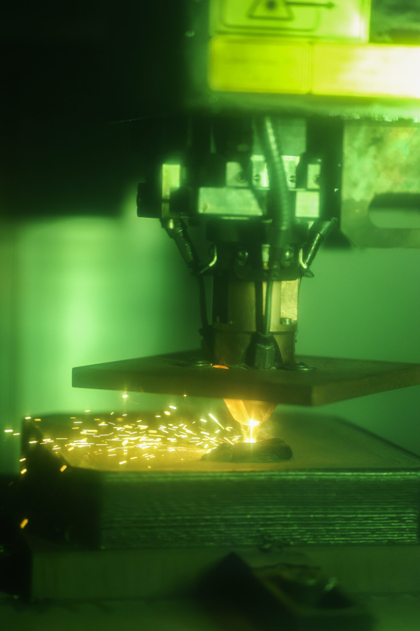 Team members are manufacturing a conformal cooling channel injection mold for a technical collaboration using the Okuma MU-8000V-L LASER EX, at the Manufacturing Demonstration Facility